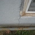 Basement Window Crack in Foundation.JPG